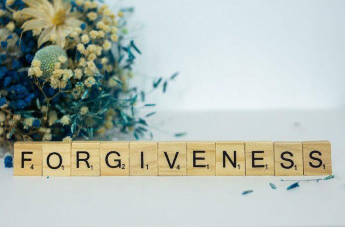 Scrabble Pieces Spelling Forgiveness